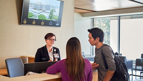patients checking in the waiting reception of the new stanford hospital emergency department