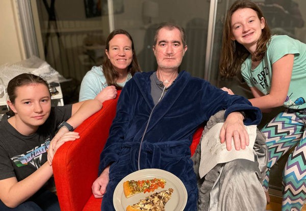 Rand Bresee and his wife, Michelle, center, treasure time with their daughters, Blakely, left, and Gretchen, as he recovers from surgery.